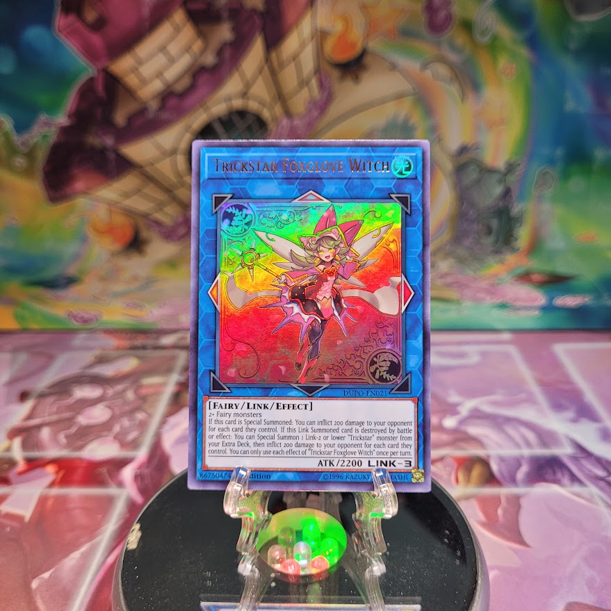 An Ultra Rare "Trickstar Foxglove Witch" card from the Yugioh Set: Duel Power.