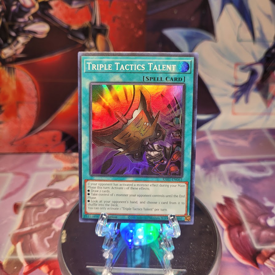 A Super Rare "Triple Tactics Talent" card from the Yugioh Set: Rarity Collection 1 (RA01).