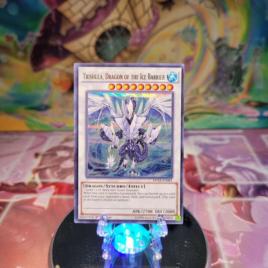 An Ultra Rare "Trishula, Dragon of the Ice Barrier" card from the Yugioh Set: Duelist Saga.
