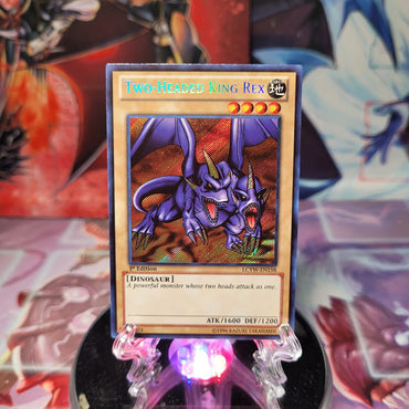 A Secret Rare "Two-Headed King Rex" card from the Yugioh Set: Legendary Collection 3: Yugi's World.