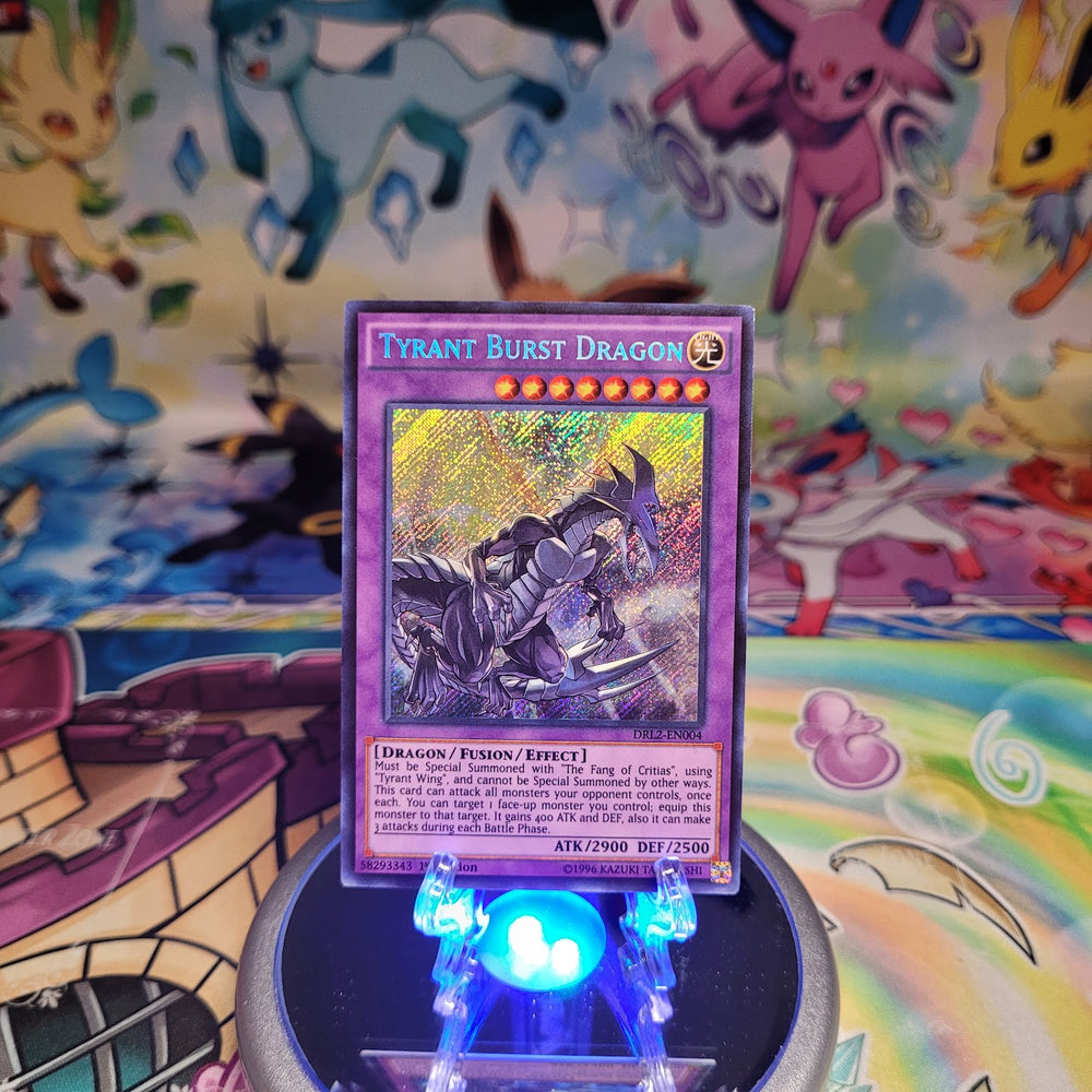 A Secret Rare "Tyrant Burst Dragon" card from the Yugioh Set: Dragons of Legend 2 (DRL2).