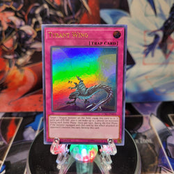 An Ultra Rare "Tyrant Wing" card from the Yugioh Set: Legendary Collection: Kaiba.