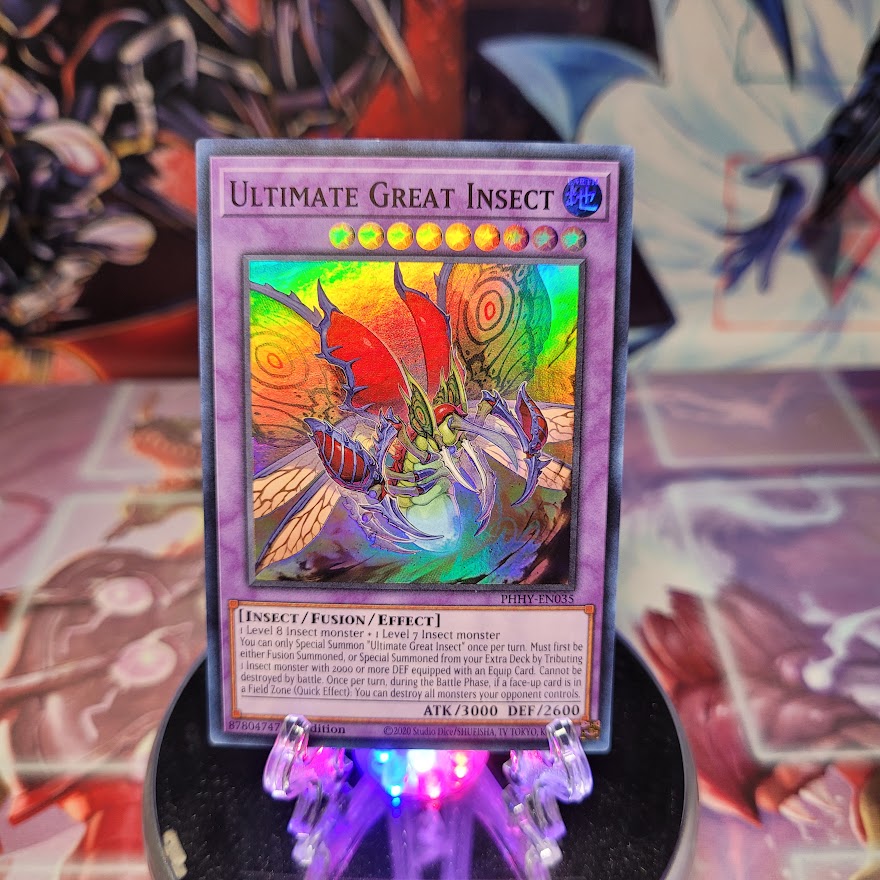 A Super Rare "Ultimate Great Insect" card from the Yugioh Set: Photon Hypernova.