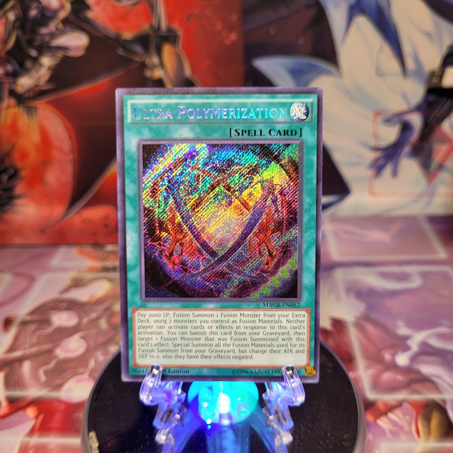 A Secret Rare "Ultra Polymerization" card from the Yugioh Set: Maximum Crisis.