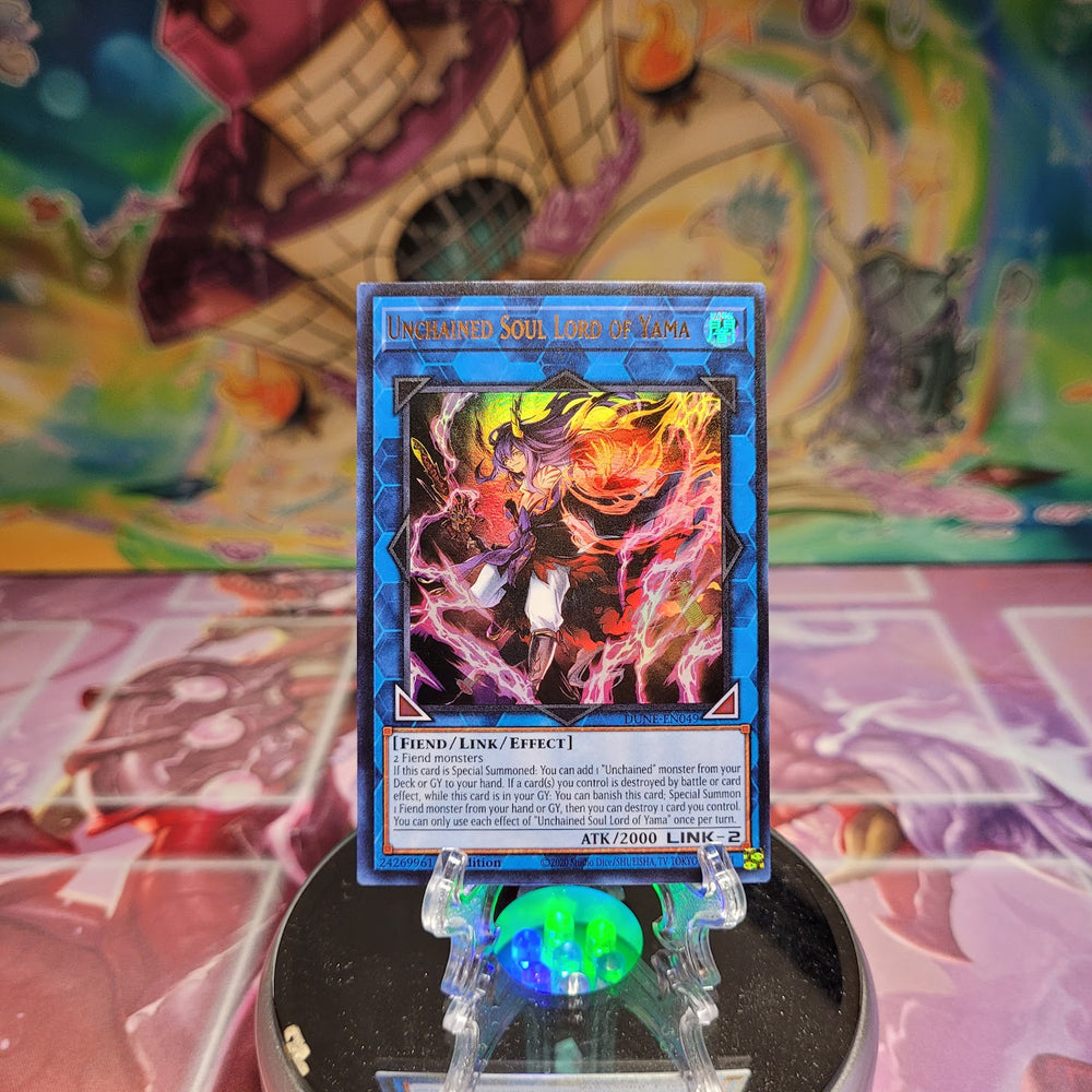 An Ultra Rare "Unchained Soul Lord of Yama" card from the Yugioh Set: Duelist Nexus (DUNE).