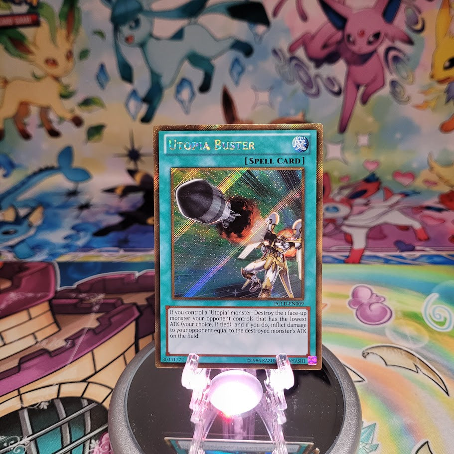 A Gold Rare "Utopia Buster" card from the Yugioh Set: Premium Gold (PGLD).