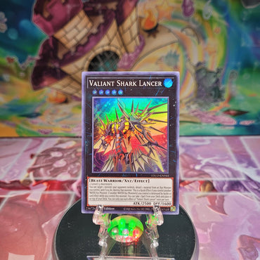 A Super Rare Purple "Valiant Shark Lancer" card from the Yugioh Set: Eternity Code.