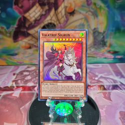 A Super Rare "Valkyrie Sigrun" card from the Yugioh Set: Toon Chaos.