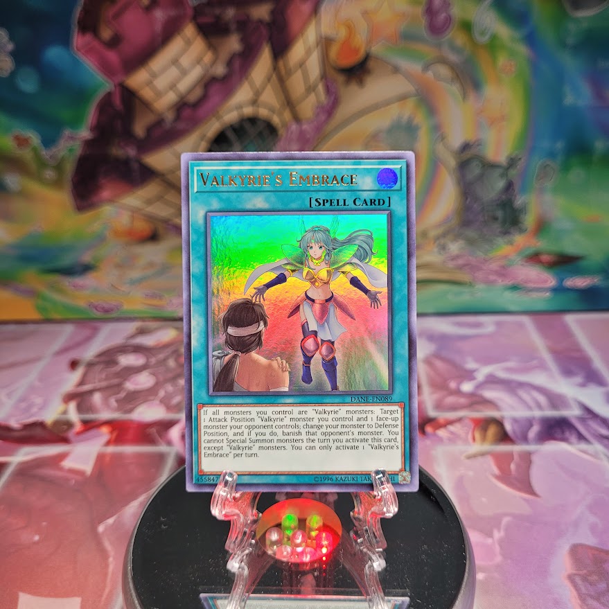 An Ultra Rare "Valkyrie's Embrace" card from the Yugioh Set: Dark Neostorm.