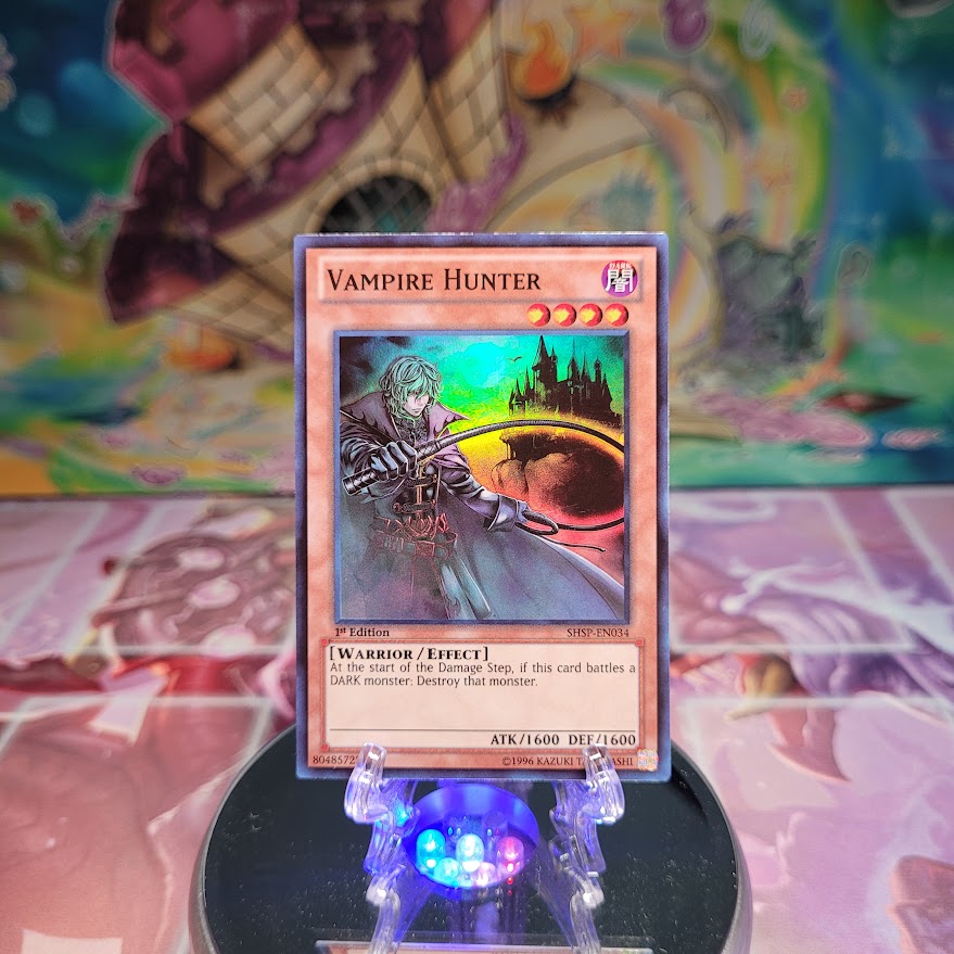 A Super Rare "Vampire Hunter" card from the Yugioh Set: Shadow Specters (SHSP).