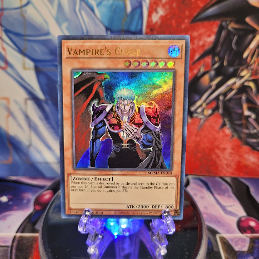 An Ultra Rare "Vampire's Curse" card from the Yugioh Set: Magnificent Mavens.