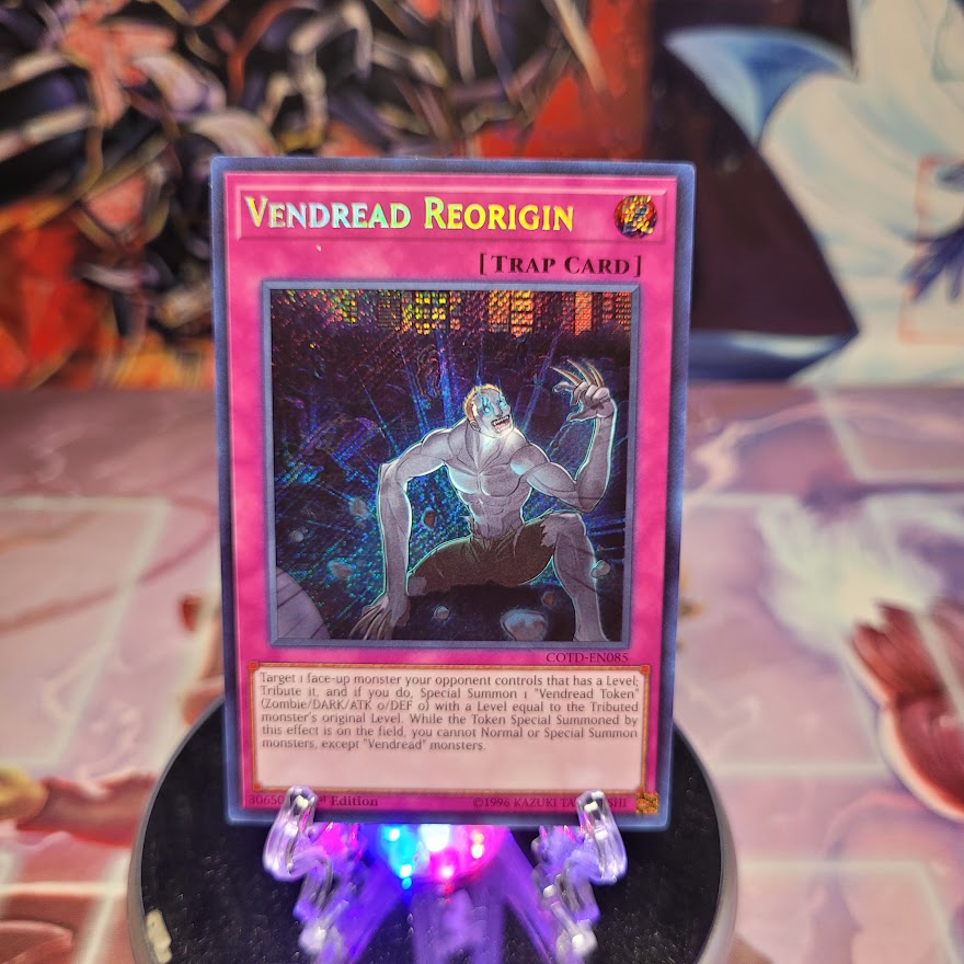 A Secret Rare "Vendread Reorigin" card from the Yugioh Set: Code of the Duelist (COTD).