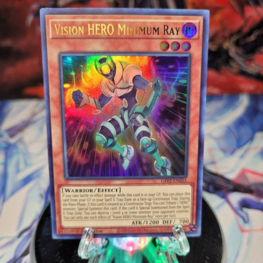 An Ultra Rare "Vision Hero Minimum Ray" card from the Yugioh Set: Ghosts From the Past: The 2nd Haunting (GFP2).