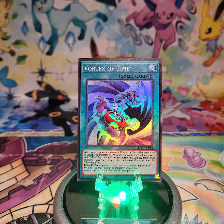 A Super Rare "Vortex of Time" card from the Yugioh Set: Maze of Muertos (MZMU).