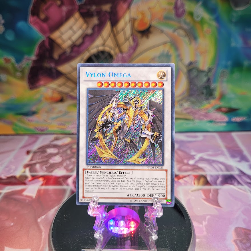 A Secret Rare "Vylon Omega" card from the Yugioh Set: Hidden Arsenal 6: Omega Xyz.