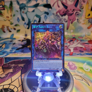 A Secret Rare "W:P Fancy Ball" card from the Yugioh Set: Magnificent Monsters (MAMO).