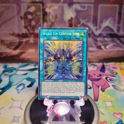 A Prismatic Secret Rare "Wake Up Centur-Ion!" card from the Yugioh 2025 Mega-Tins Mega Pack (MP25).