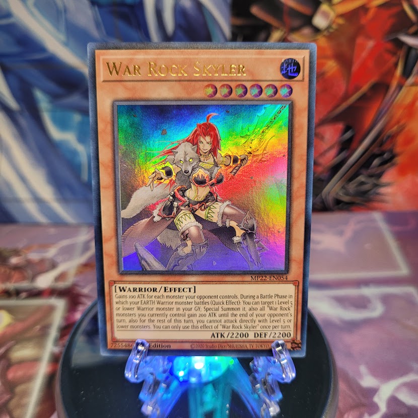 An Ultra Rare "War Rock Skyler" card from the Yugioh 2022 Tin of the Pharaoh's Gods Set.