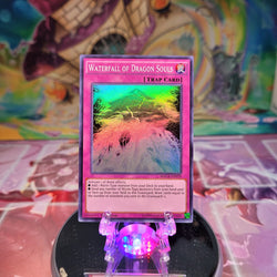 A Super Rare "Waterfall of Dragon Souls" card from the Yugioh Set: Maximum Crisis.