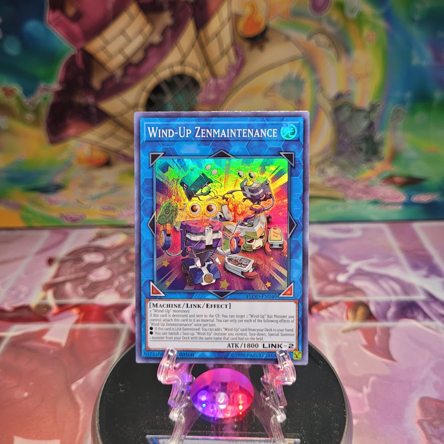 A Super Rare "Wind-Up Zenmaintenance" card from the Yugioh Set: Flames of Destruction.