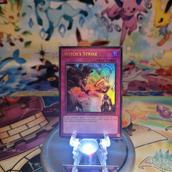 An Ultra Rare "Witch's Strike" card from the Yugioh Set: Battles of Legend: Glorious Gallery (BLGG).