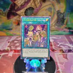 A Secret Rare "Witchcrafter Creation" card from the Yugioh Set: The Infinity Chasers (INCH).