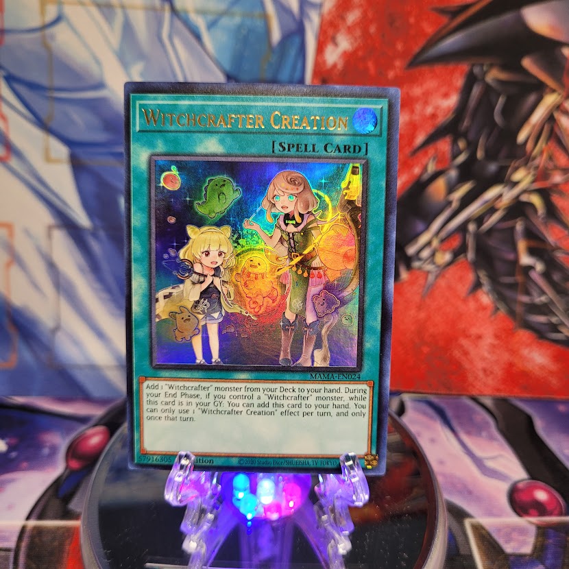 An Ultra Rare "Witchcrafter Creation" card from the Yugioh Set: Magnificent Mavens.