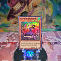 A Super Rare "Witchcrafter Edel" card from the Yugioh Set: The Infinity Chasers.