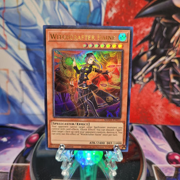 An Ultra Rare "Witchcrafter Haine" card from the Yugioh Set: Magnificent Mavens.