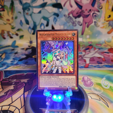 An Ultra Rare "Witchcrafter Madame Verre" card from the Yugioh Set: Magnificent Monsters (MAMO).