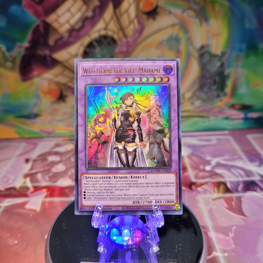 An Ultra Rare "Witchcrafter Vice-Madame" card from the Yugioh Set: Magnificent Mavens.