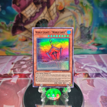 A Super Rare "World Legacy - "World Lance"" card from the Yugioh 2019 Gold Sarcophagus Tins.