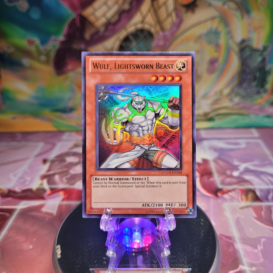 An Unlimited Edition Ultra Rare "Wulf, Lightsworn Beast" card from the Yugioh Set: Legendary Collection 2.