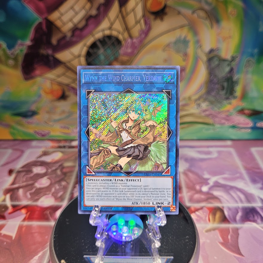  A Secret Rare "Wynn the Wind Charmer, Verdant" card from the Yugioh Set: Quarter Century Bonanza (RA03).