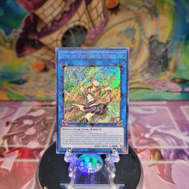  A Secret Rare "Wynn the Wind Charmer, Verdant" card from the Yugioh Set: Quarter Century Bonanza (RA03).