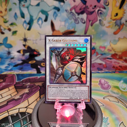 An Ultra Rare "X-Saber Gottoms" card from the Yugioh Legendary Modern Decks (L26D).