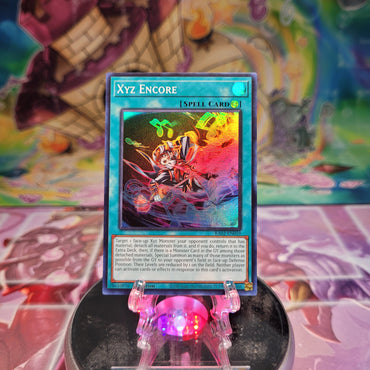 A Super Rare "Xyz Encore" card from the Yugioh Set: Rarity Collection 2 (RA02).