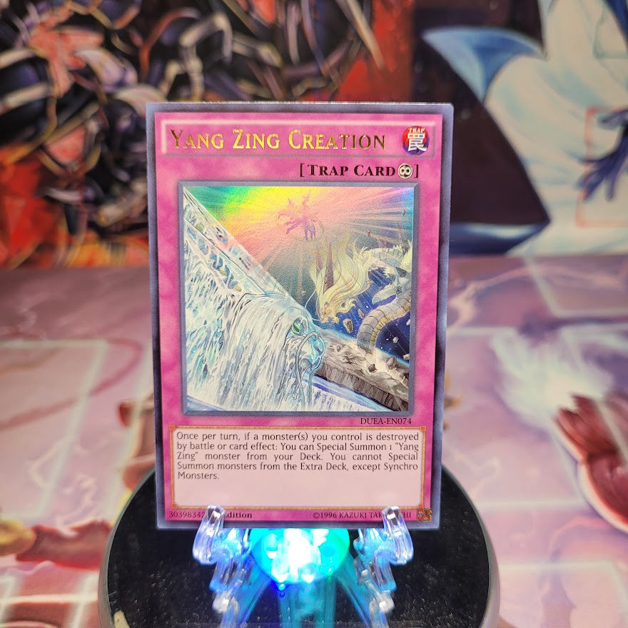 An Ultra Rare "Yang Zing Creation" card from the Yugioh Set: Duelist Alliance (DUEA).