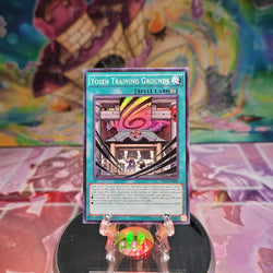 A Super Rare "Yosen Training Grounds" card from the Yugioh Set: The Secret Forces.