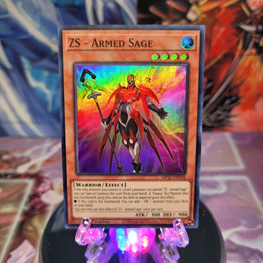 A Super Rare "ZS - Armed Sage" card from the Yugioh 2022 Tin of the Pharaoh's Gods Set. 