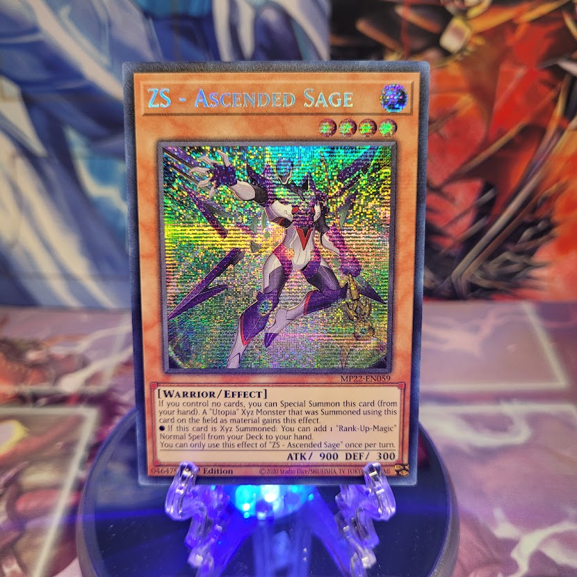 A Prismatic Secret Rare "ZS - Ascended Sage" card from the Yugioh 2022 Tin of the Pharaoh's Gods set.