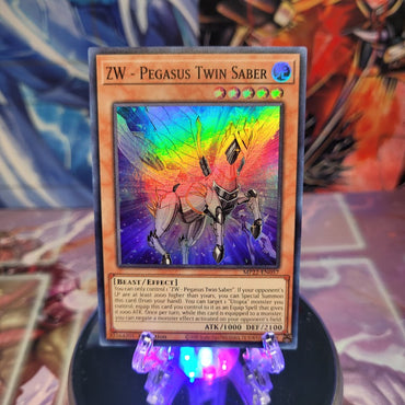 A Super Rare "ZW - Pegasus Twin Saber" card from the Yugioh 2022 Tin of the Pharaoh's Gods Set. 