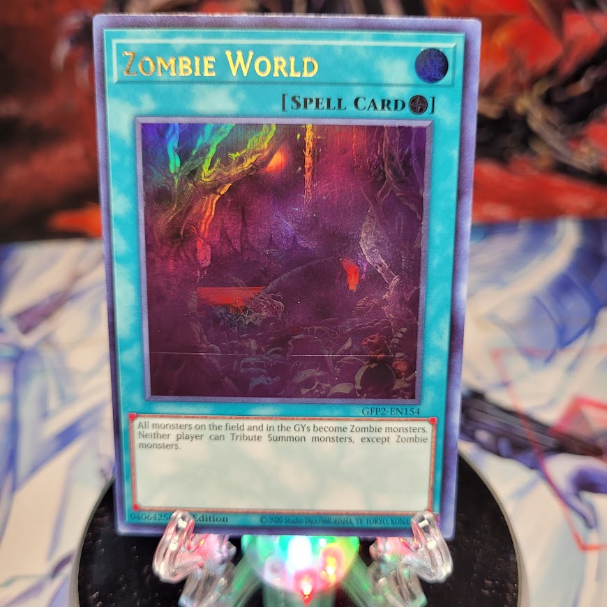  An Ultra Rare "Zombie World" card from the Yugioh Set: Ghosts From the Past: The 2nd Haunting (GFP2).