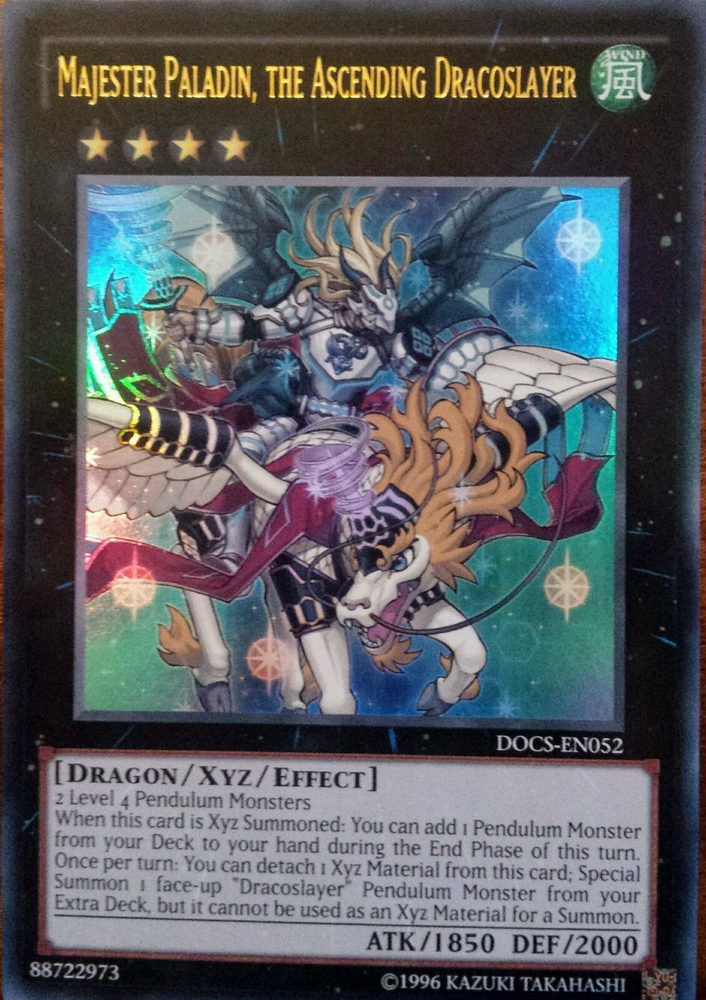 Majester Paladin, the Ascending Dracoslayer [DOCS-EN052] Ultra Rare Yu-Gi-Oh!