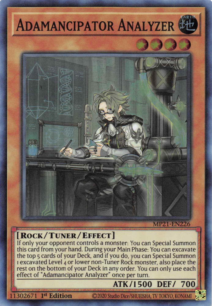  A Super Rare "Adamancipator Analyzer" card from the Yugioh 2021 Tin of Lost Memories.