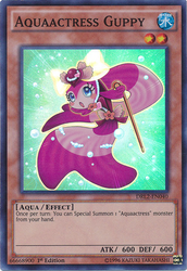 A Super Rare "Aquaactress Guppy" card from the Yugioh Set: Dragons of Legend 2.